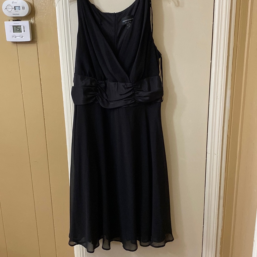 Connected apparel all black dress. Short. V neck line.